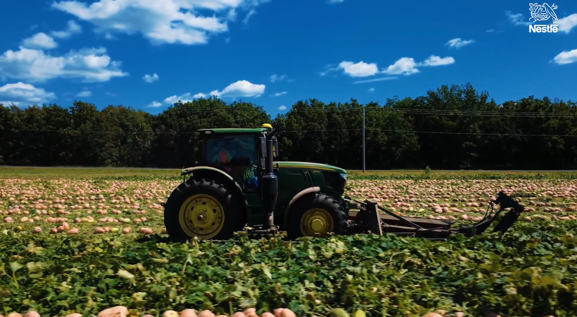 Tractor plowing field