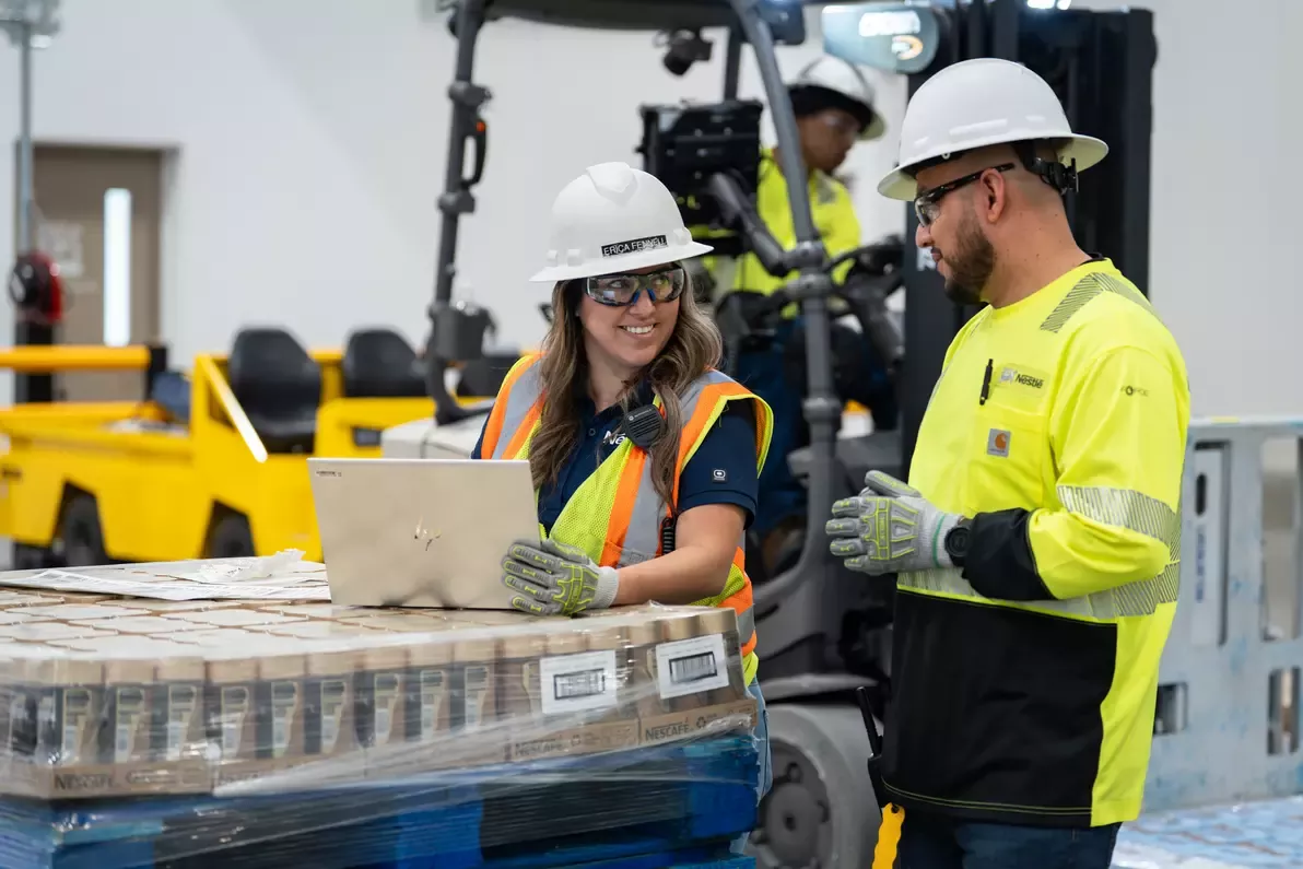 Employees working inside distribution center