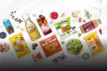 Ingredients and products arranged on a white marble background