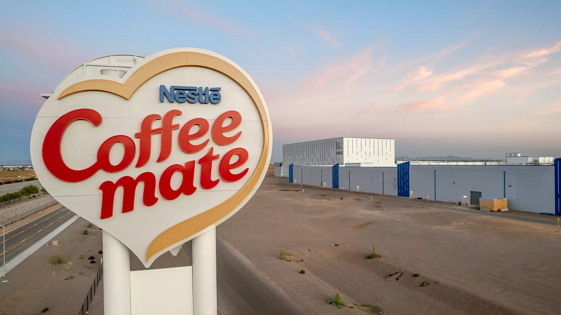 Coffee mate sign in front of new facility