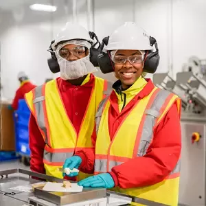 Factory workers on production line
