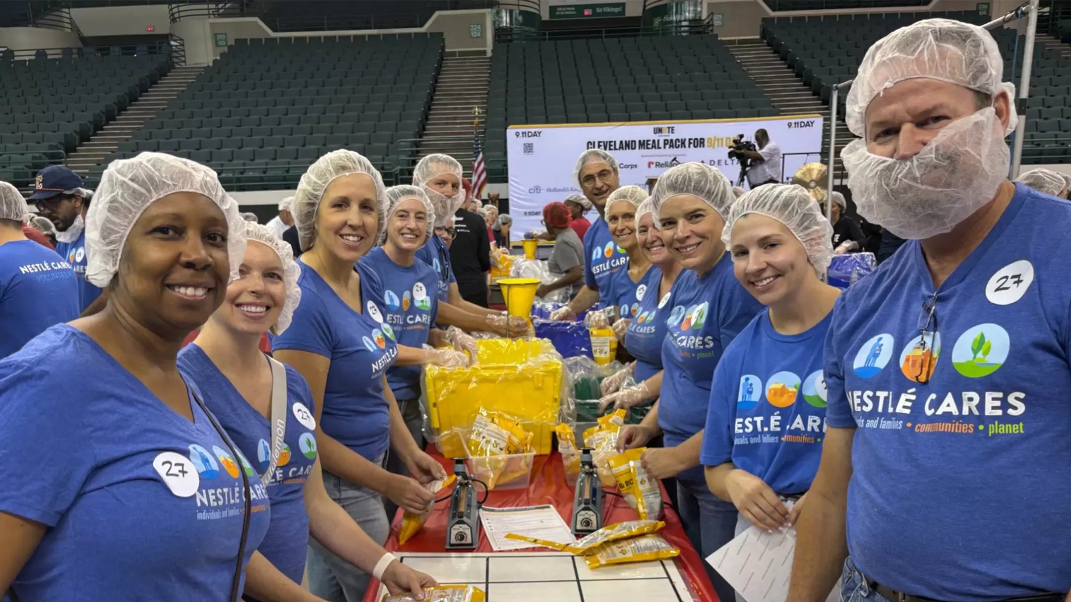 Employees packing meals