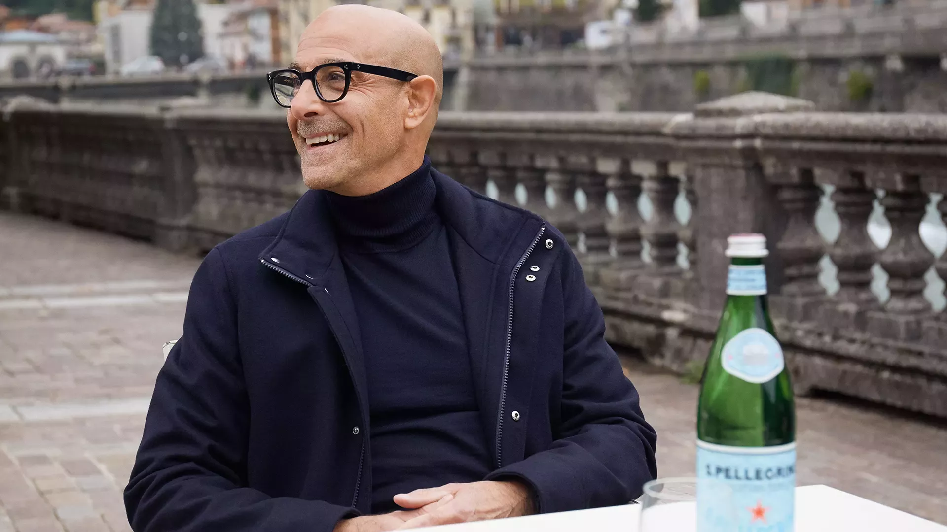 Actor Stanley Tucci enjoys bottle of S.Pellegrino water